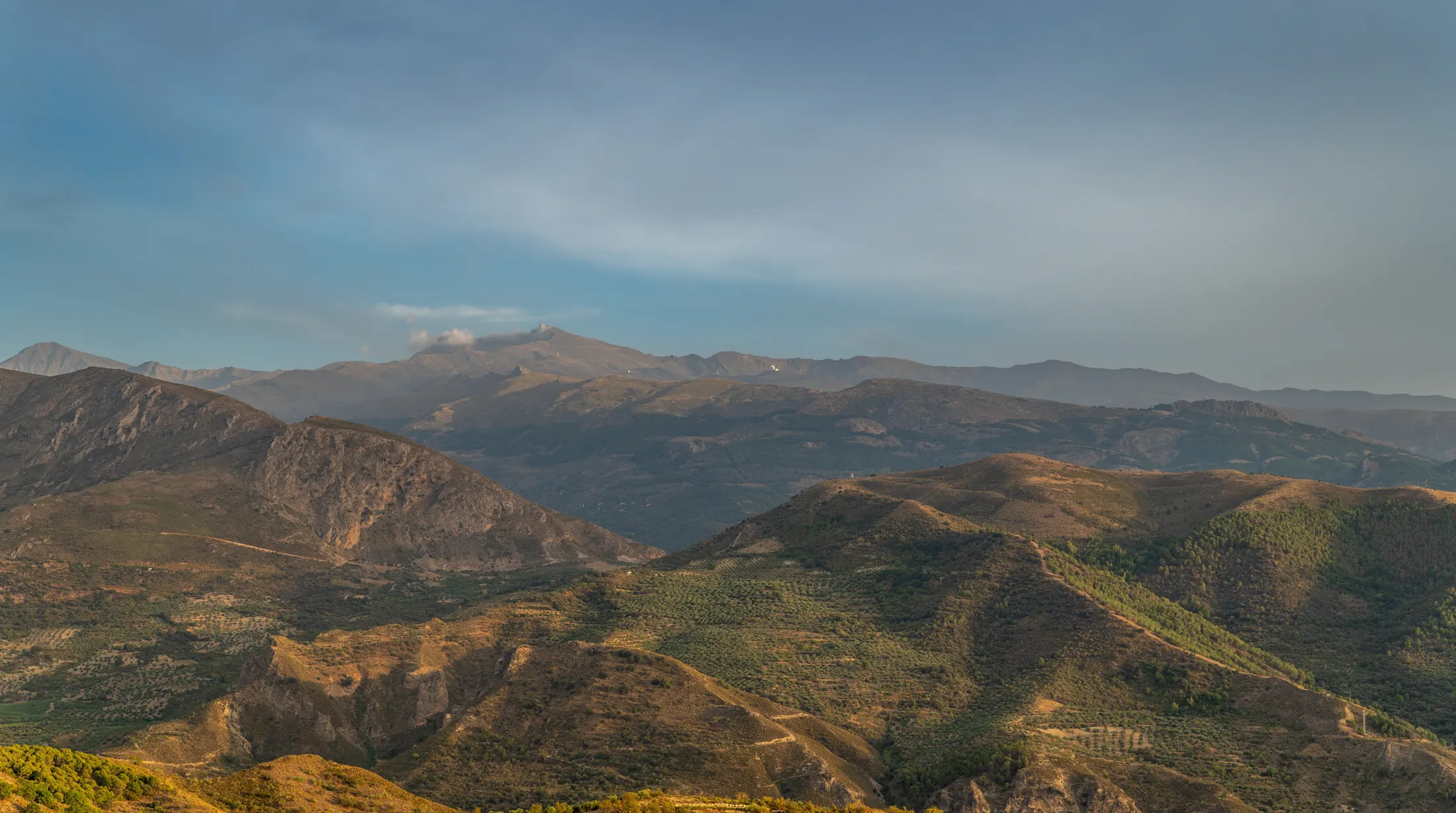 The Sierra Nevada rising above Andalucía at golden hour