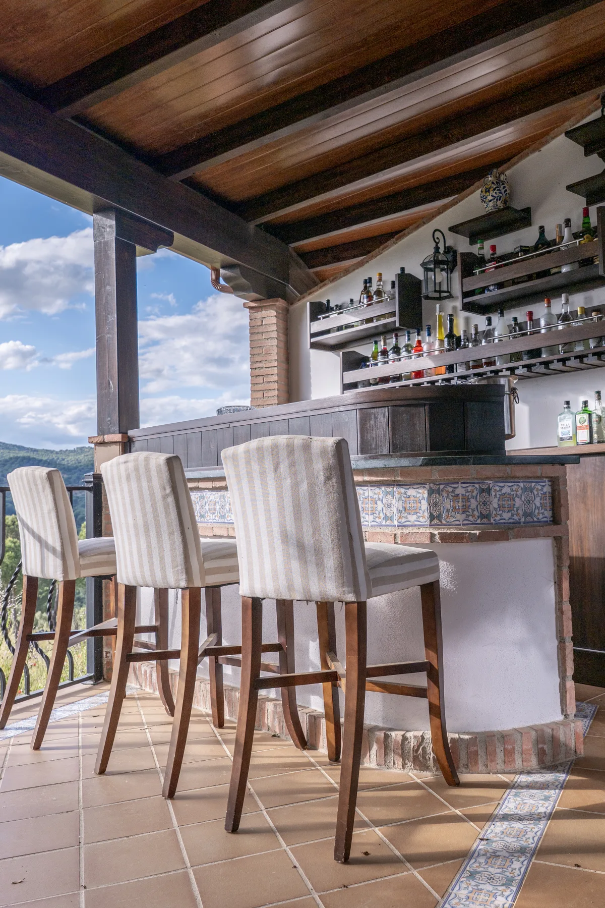 The lodge bar and its mountain outlook