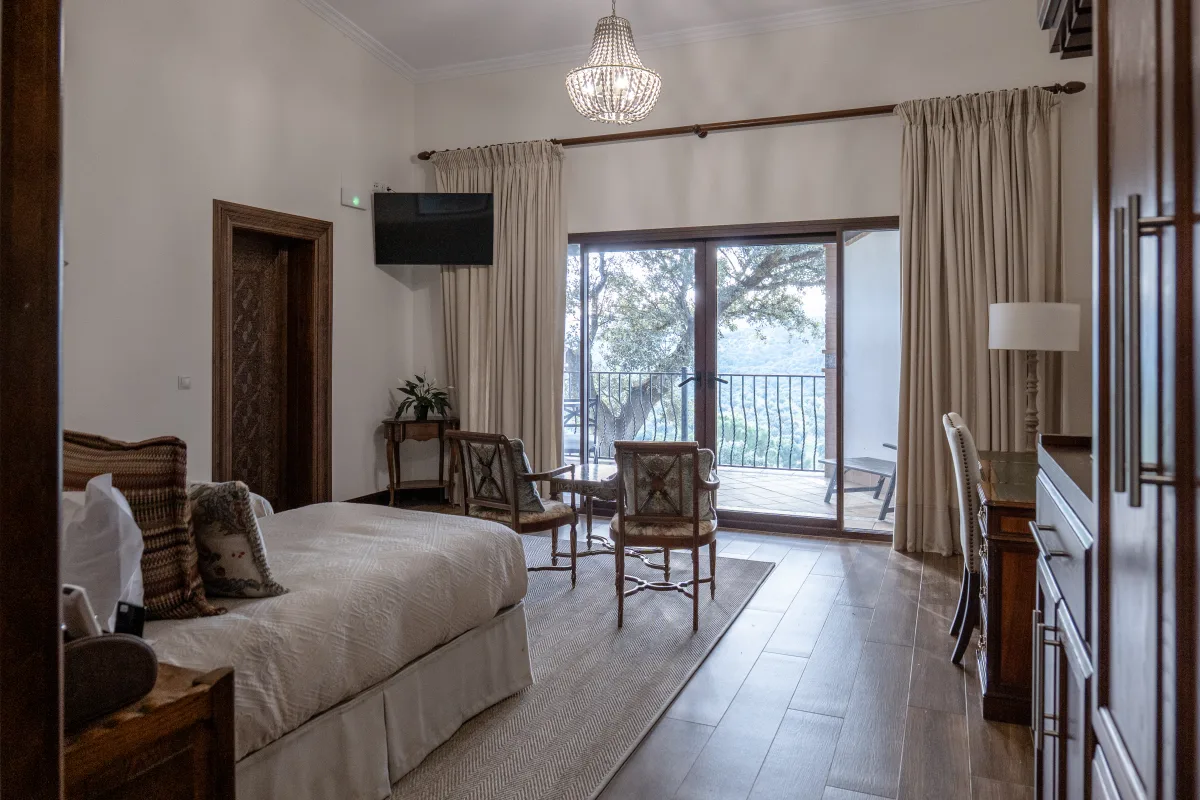 A lodge bedroom opening to the terrace